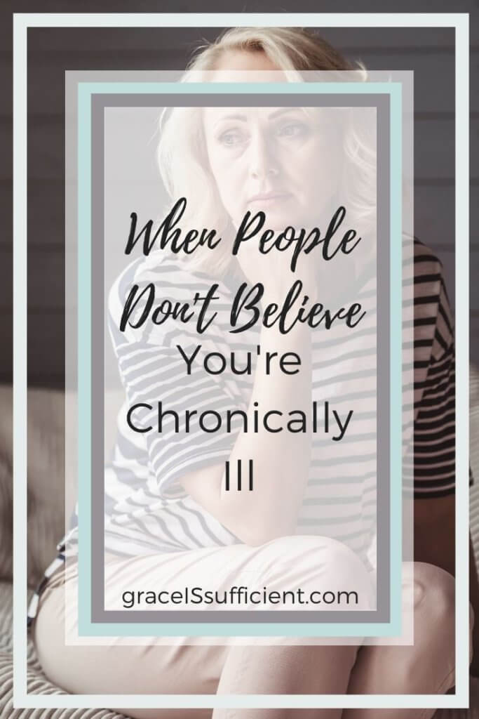 a woman looking sad sitting on the couch with the words when people don't believe you're chronically ill